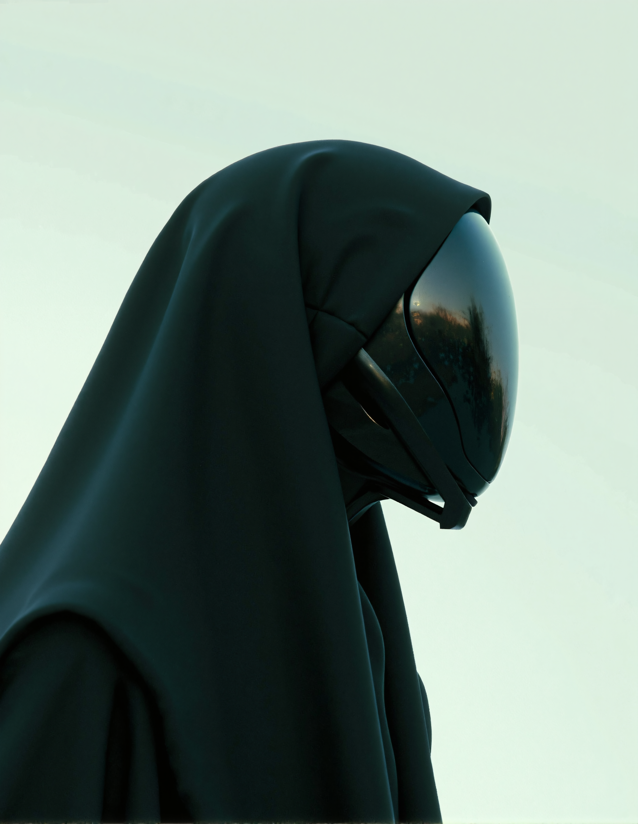UNI_SCI_FI The image presents a sleek, mysterious robotic figure, draped in a flowing black hood. With an exquisite glossy finish, the head reflects light delicately, creating an entrancing effect. The soft, minimalistic background enhances the subject’s futuristic charm, inviting viewers to ponder the blend of technology and artistry. The atmosphere is both serene and thought-provoking, embodying an innovative Midjourney style that evokes feelings of curiosity and awe. The interplay of shadows and highlights adds depth, emphasizing the unique design. This artwork is a beautiful depiction of modern aesthetics and futuristic themes.