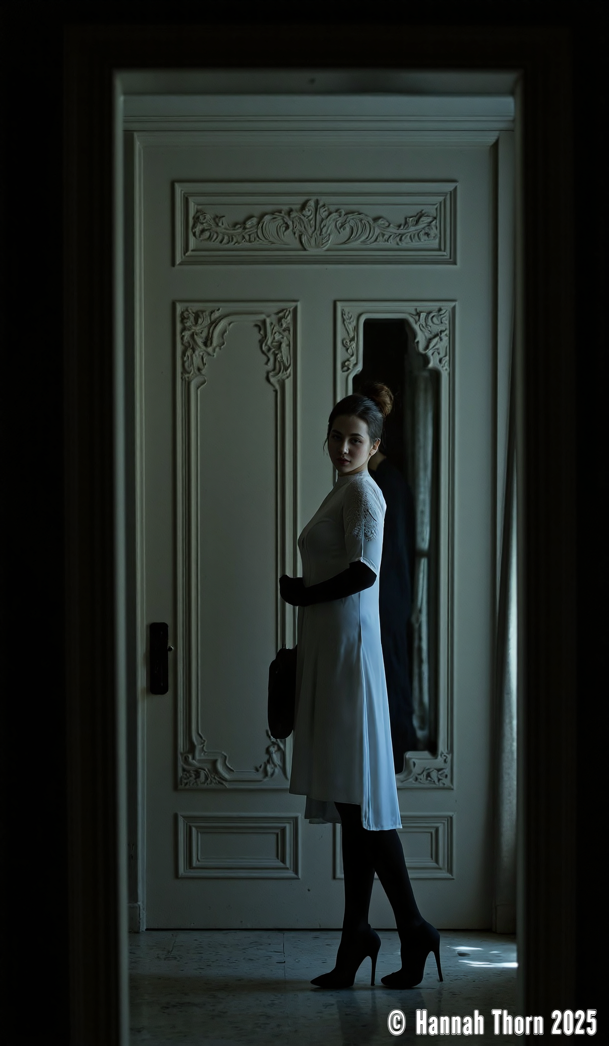 A solitary woman, echoing Hopper's mood, stands with her back to the viewer before an ornate doorway, her bun neat, clad in a non-sheer long-sleeved dress, gloves, tights, and heels, clutching a bag, embodying quiet tension. Cinematic lighting, soft and directional like Gordon Willis, illuminates her form from eye level. A 50mm lens at f/2.8 captures the scene with shallow depth of field, focusing on the bag. Subtle volumetric light and film grain add depth and a classic noir aesthetic. Composed using the rule of thirds, emphasizing her isolation. Post-processed for subtle contrast, a 35mm film photograph quality (in the style of Peter Lindbergh), highly detailed, bokeh. FLUX.1-dev.<lora:_Flux\_Skin_Appearance\detailifier_flux-000006.safetensors:0.8000000000000002:0.8000000000000002>