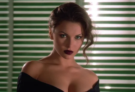 CinematicPortrait woman analog photo brunette (provocative slavic cleavage)  masterpiece indoors, (glossy dark lipstick), green eyes, (blinds backlight), soft focus, depth of field, film grain, (((looking at viewer))) <lora:CinematicPortraitXL_v3:0.25>  <lora:EuroBabe-v4-XL:0.35>