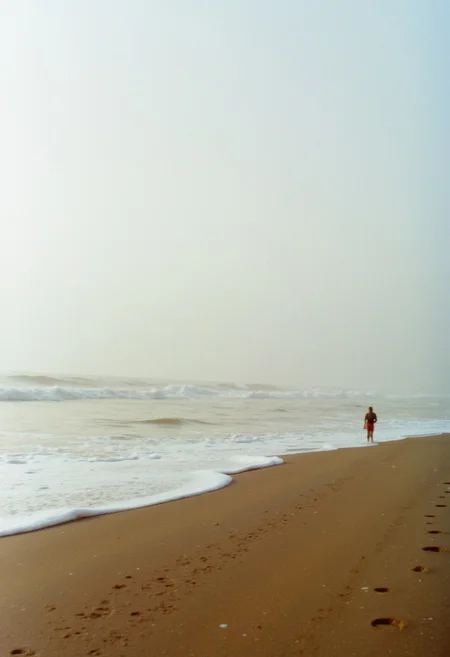 c41_hasselblad_portra400_FLUX, instagram photo a foggy beach in sri lanka, film grain, soft shadows