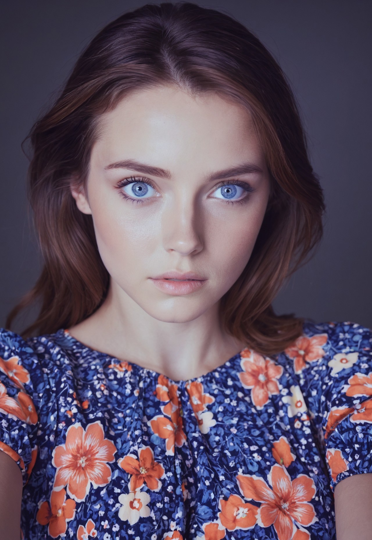 instagram photo, front view, portrait photo of a 24 y.o woman, brown hair, blue eyes,wearing floral dress, beautiful face, cinematic shot