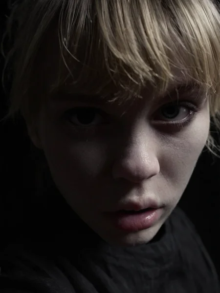 Cinematic fashion photograph Adeera_Addams_P_MXAI_SDXL , angry expression, extreme closeup shot, black background,