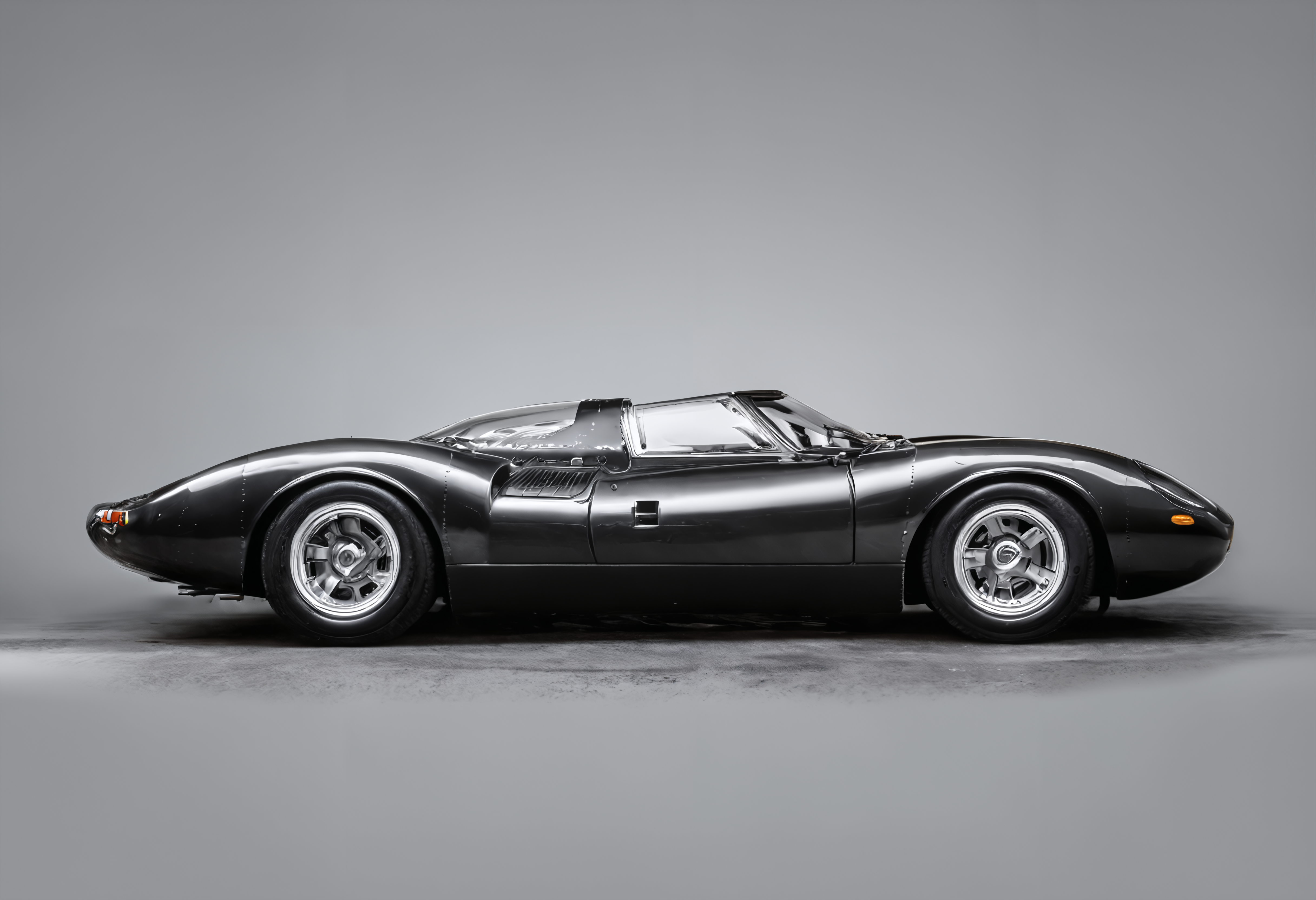 an (stylized minimalism greyscale line drawing:1.5) of a  Charcoal Black jaguarxj13, l960sm1deng1ne, on a plain gradient background in the rain, splashes mist fog, dynamic speed motion blur,  side view ,  ,  dark, chiaroscuro, low-key  low color saturation, concept art, perfect composition, masterpiece, professional photography, zeiss lens, shot on dslr 64 megapixels, sharp focus, intricately detailed, dramatic, tilt shift, f/32,