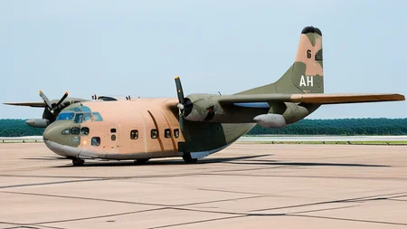 technical photograph of USAF (AIR_C123:2) sitting on an air force base runway, extremely detailed, infinite depth of field, f1.4, <lora:AC_C123:1>