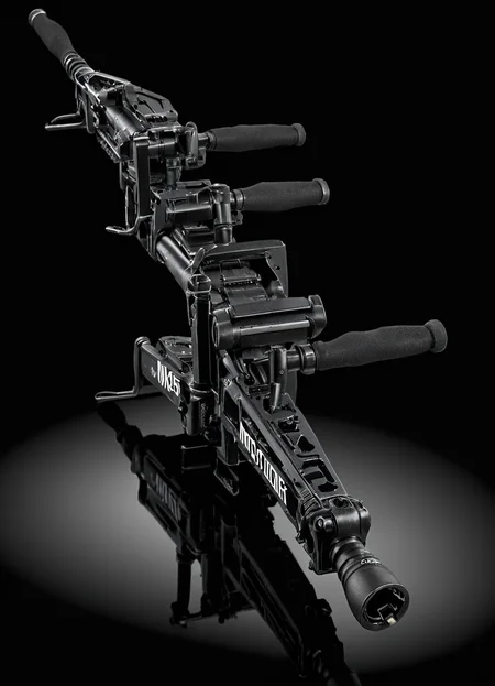 product advertisment photo of a m56smrt weapon, text "More Power!" in bold letters, displayed on a glass surface, refelctions, glossy, dark background,
 <lora:M56_Smartgun_-_Aliens_SDXL:1>
