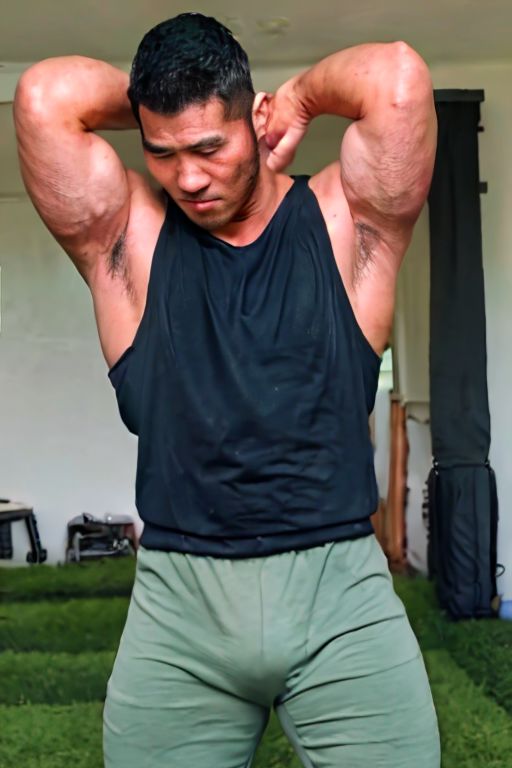 asian sexytrainer, tank top/sleeveless shirt, shorts/sweatpants/leggings, realistic, masterpiece, intricate details, detailed background, depth of field, photo of a handsome, dynamic pose, sweaty, sidepec, exercise, natural face expression, detailed Hunter Kang face, big remarkable nipples covered by sleeveless shirt, big bulge pants, serious manly face, arms up, hairy armpits, lying on the beds in his house