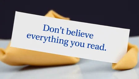 FORTUNE COOKIE WITH THE WORDS "DON'T BELIEVE EVERYTHING YOU READ" WRITTEN ON IT,<lora:fortune-cookie-flux-000010:1>,