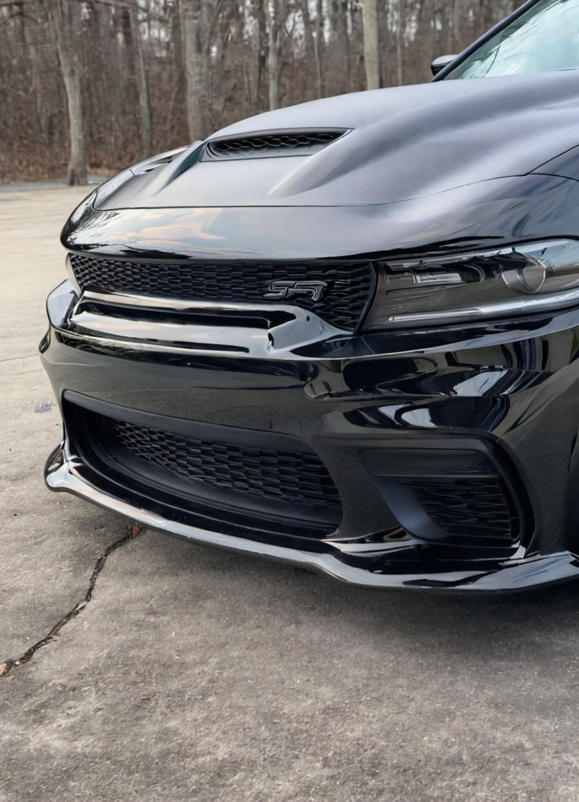 black chargerhellcatsrt seen from a very low angle, parked, front view, 
 <lora:ChargerHellcatSDXL:1>
