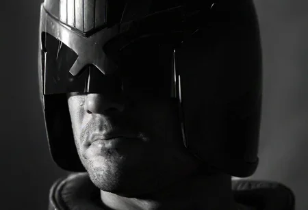 zavy-cnmtc, (((black and white, monochrome, greyscale, bw))), BREAK, solo, silhouette, close up, portrait, jdgdrdd, man, helmet armor, scowl, stubble, smoke, detailed skin texture, noise, detailed, high quality, cinematic lighting, contrast, heavy dynamic shadows, atmospheric,