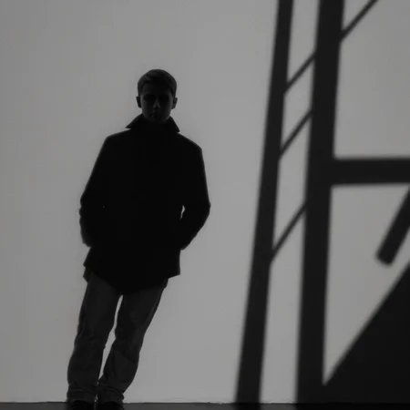 Hyperrealistic art of <lora:Cinematic Film Stock Footage Style:1> Kodak Film Still
dramatic, light, shadow, partially covered in shadow, solo, 1boy, monochrome, greyscale, male focus, glowing, silhouette , Cinematic Film Stock Footage Style, Extremely high-resolution details, photographic, realism pushed to extreme, fine texture, incredibly lifelike