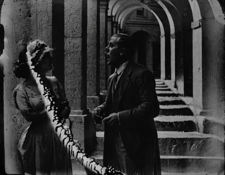 <lora:fdec:0.8>fdec man and woman standing on collonade
photograph from 1920s