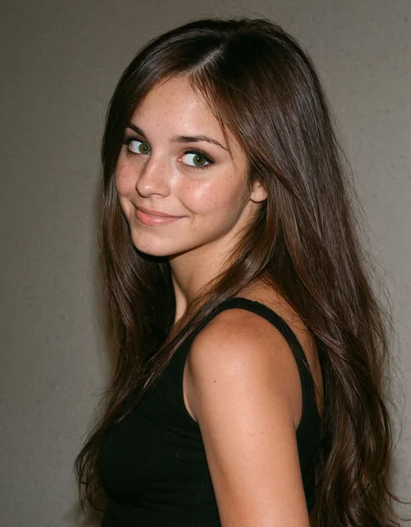 A candid paparazzi-style image of an exceptionally pretty young woman almost like a goddess beauty, she has long brown hair and green eyes, she has nice deep brown skin, she has a subtle smile that is barely considered a smile, she's looking away avoiding the camera as if she's shy of some sort, she's wearing a cute black top, hyper realistic, flash photography, unedited, close up. <lora:epiCRealnessRC1:1>