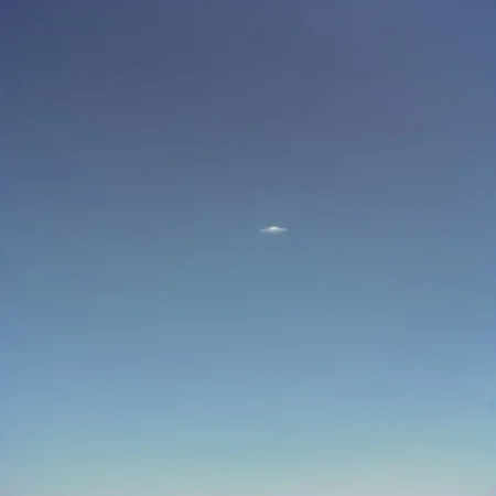 (olddigitalcamera, raw, light leak, film grain, jpeg artifacts, low res, low quality):2, distant UFO, flying saucer, hovering in the sky, far away