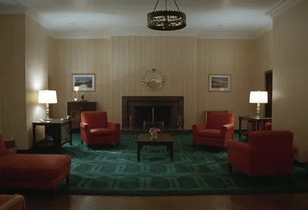 room 237, living room, indoors, Overlook Hotel, CineShining, highly detailed, 4K, (stylish grainy analog 35mm film photo)