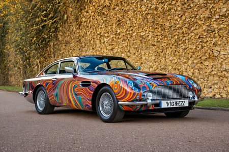 Psychedelic style <lora:AB ILL Vehicle:1>,Andrew Bell,classic car,aston martin,<lora:CHV-Zoom-000005:1>,Cornelisz Hendriksz Vroom,cinematic, . Vibrant colors, swirling patterns, abstract forms, surreal, trippy<lora:stvmccrr:1><lora:stvmccrr:1><lora:stvmccrr:1><lora:stvmccrr:1>