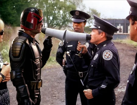 Dredd1024, a man in uniform, highly detailed , photography, ultra sharp, film, bokeh, professional, 4k, highly detailed   <lora:add-detail-xl:1.5> <lora:Dredd1024:0.7>