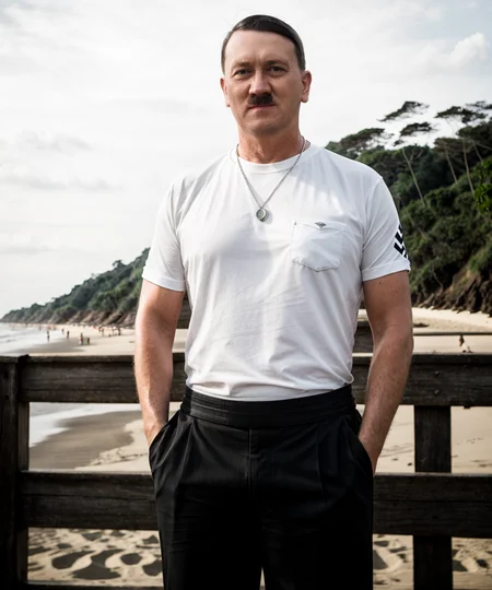 hitler, a man, ((Goa beach)), Goa, white T-shirt, looks at camera, black shorts, glass of beer, ((smiling)), Masterpiece, best quality,photography, detailed skin, realistic, photo-realistic, 8k, highly detailed, full length frame, High detail RAW color art, diffused soft lighting, shallow depth of field, sharp focus, hyperrealism, cinematic lighting , <lora:adolff:0.8>