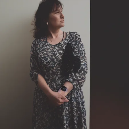 woman standing dressed