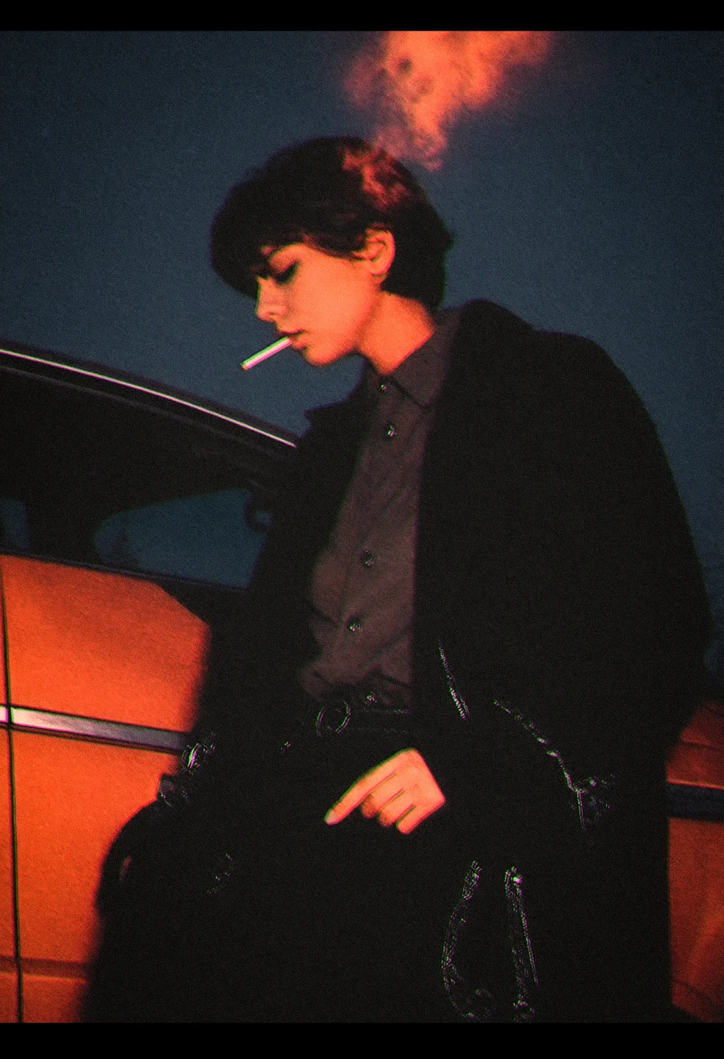 amateur photo,
(film grain:1.0), polaroid photo,
outdoors, car, smoking cigarette, short hair, coat, black and white, low angle, closed eyes, moonlight, witchcore, abstract, chromatic aberration,
best quality, normal aesthetic, very detailed, intricate details, photorealistic, realistic,
<lora:leaked_nudes_style_v1_fixed:1>