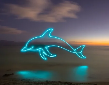 cyan light painting of a dolpin