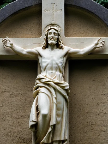 jesus on a stone cross <lora:talesofthegraveyard:1>
