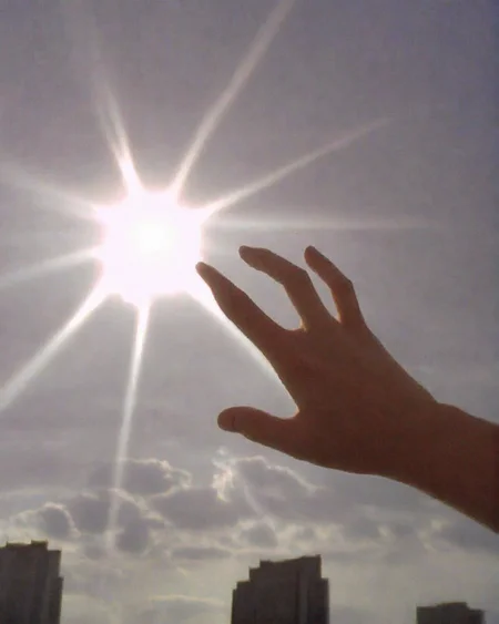 , building , cityscape, photo, cloud, sunray, fingers, hand, pov <lora:lowfi-step00015000:1>