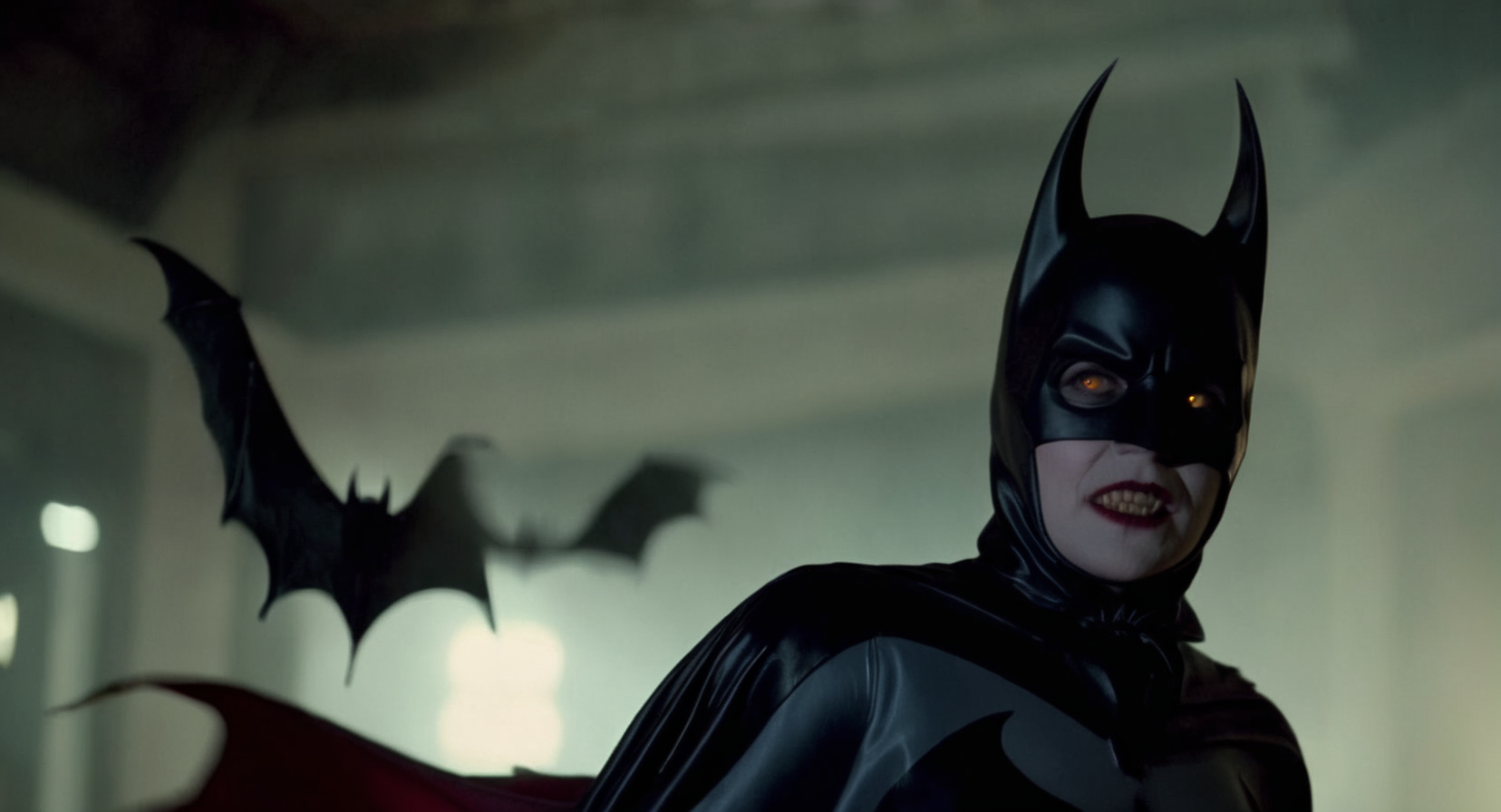cinematic film still of  Cinematic Film stock footage in (arri alexa style) Kodak film print,   <lora:Batman Vampire:1> <lora:Vampire-000003:1> female Batman Vampire a woman in a bat costume and vampire fangs, shallow depth of field, vignette, highly detailed, high budget, bokeh, cinemascope, moody, epic, gorgeous, film grain, grainy