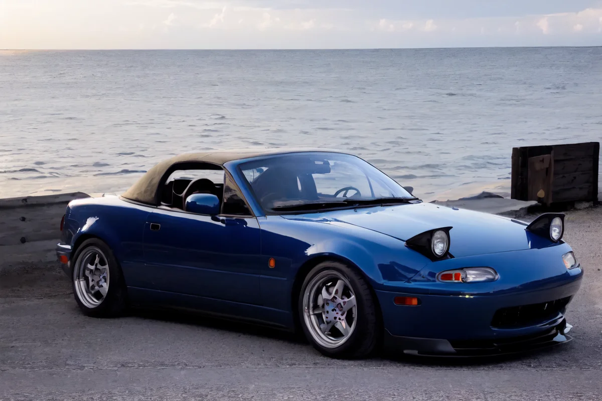 absurdres, ((masterpiece, best quality)),extremely_detailed_wallpaper, illustration, car, bright ,shinny ,shinny sky, ((beautiful detailed sky)) ,(((seaside))),blue water,sunny,sun,morning, cloudy sky, sky,outdoors ,light, cloud, ((backlight)) ,light,sports car,vehicle focus, <lora:MX5NA-000008:0.8>