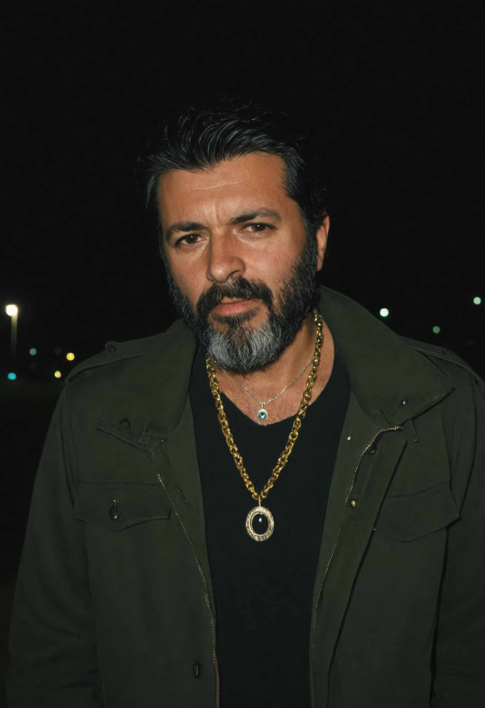 nighttime, 1boy, male focus, beard, solo, facial hair, necklace, jewelry, black hair, jacket, mature male, <lora:sdxl_nighttime:1>