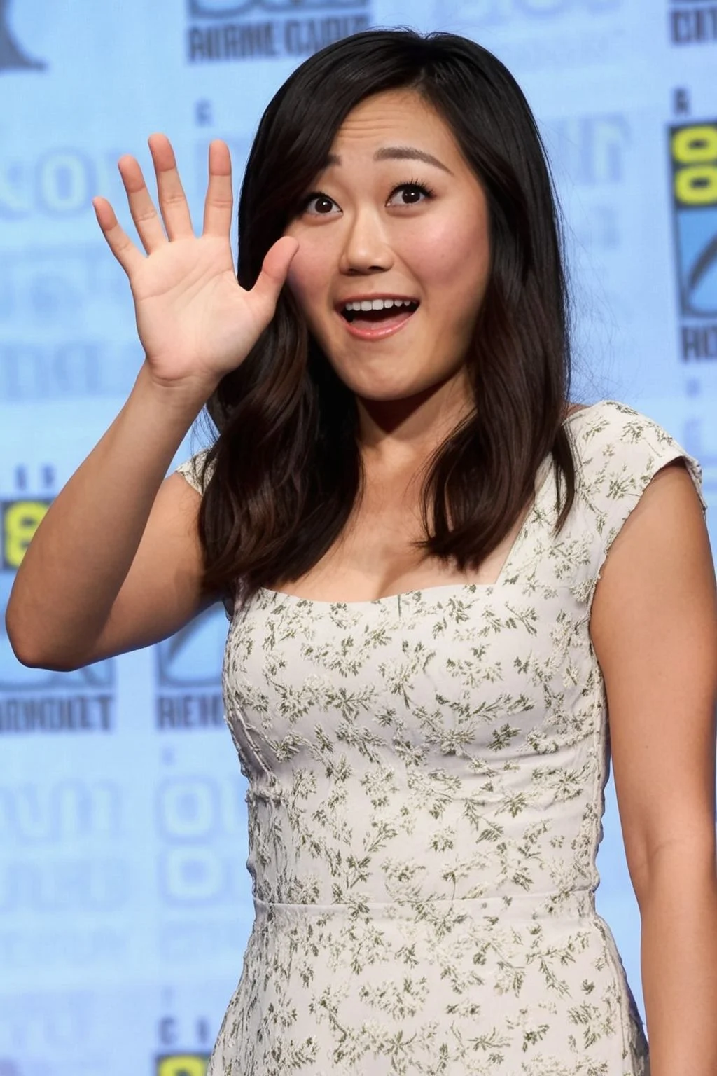 karenfukuhara, 1girl, brown eyes, standing, photo(medium), on stage, comic-con background, white floral dress, looking at someone, shocked expression, waving to someone, cinematic lighting, photorealistic, ultra-sharp, detailed, professional photographer, black hair, blurry background, bokeh, rule of thirds