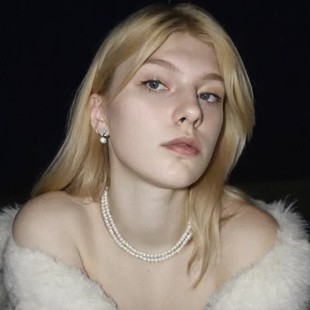 hunter schafer, amateur photo, 1986, vintage Photobooth, grainy, (detailed facial features), (freckles:0.05), (acne:0.025), platin yellow mullet hair, young woman, sharp featured face, light blue lipstick, pale skin, tired face, white Faux Fur Off The Shoulder Dress, pearl earrings and pearl necklace, emme frost, porn fantasy, tight body, low angle shot, film grain, night outside, <lora:leaked_nudes_style_v1_fixed:1>