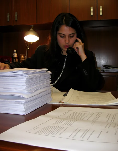 <lora:amateurphoto-6version:1> Amateur photography of               , on flickr in 2007, 2005 blog, 2007 blog
lawyers' office, desk, cabinets, documents, stacks of paperwork, lawyer sitting behind the desk, stressed, phone in hand, black suit, black hair, led light,