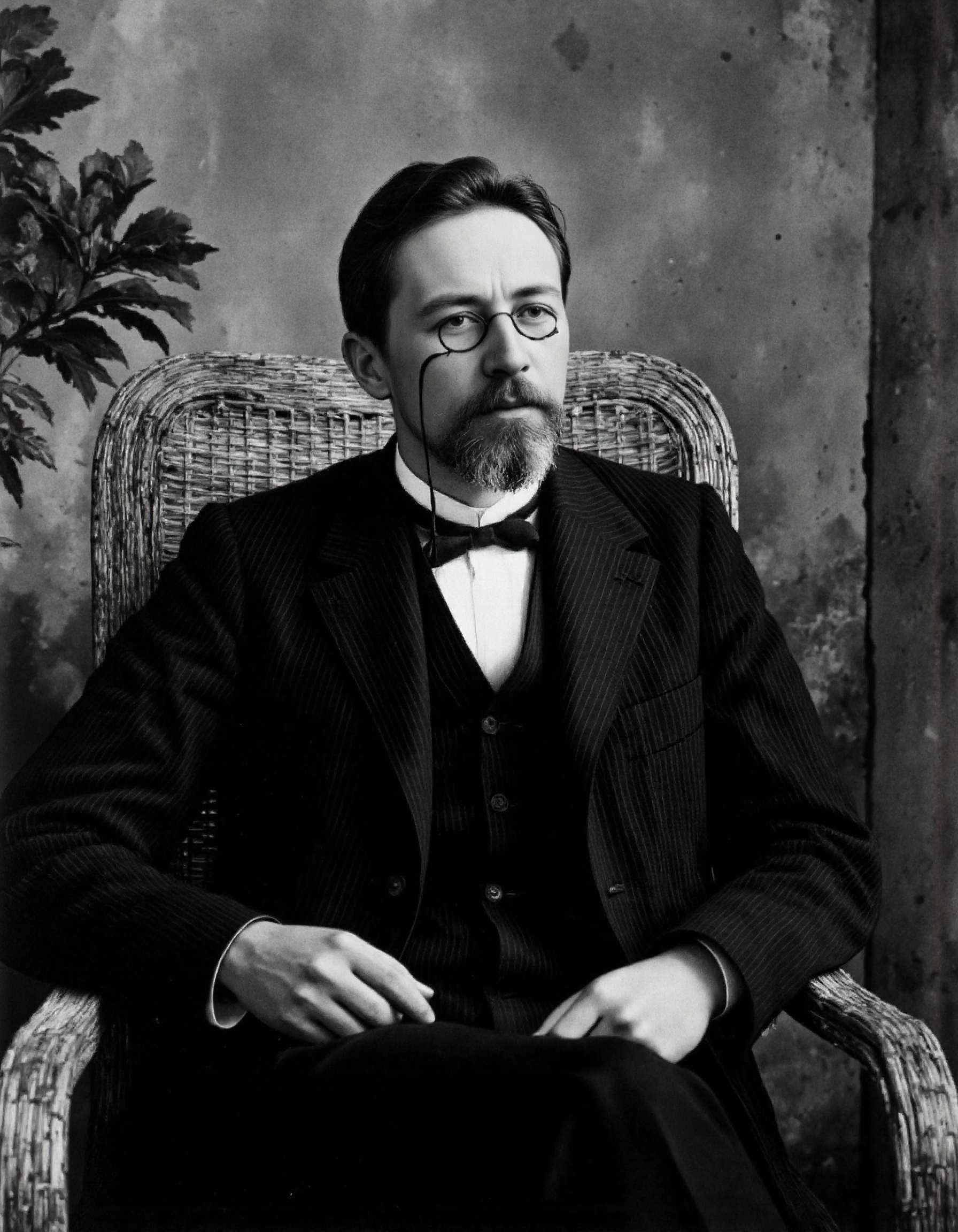 Rembrandt style, <lora:Dark_Ghibli:0.6>, This black-and-white photograph captures a man in a formal, pinstriped suit seated in a wicker chair. The man, with a full beard and glasses, is dressed in a black suit jacket with thin vertical stripes, a white dress shirt, a black bow tie, and black trousers. He is resting his right arm on the armrest of the chair, which has a woven, natural texture. His left arm is relaxed on his lap. The background shows a rough, textured wall with a plant on the left side, adding a natural element to the composition. The lighting is soft and even, casting gentle shadows that enhance the textures of the wicker chair and the manâs suit. The photograph has a classic, vintage feel, possibly dating back to the early 20th century, as indicated by the style of clothing and the chair. The man's demeanor is calm and contemplative, with a slight smile on his face, suggesting a moment of reflection or relaxation. The overall atmosphere is serene and timeless, emphasizing the elegance and simplicity of the subject and his surroundings.., . Baroque, chiaroscuro, realistic, emotional, "flat, <lora:Ð§ÐÐ¥ÐÐ:1>, lighting