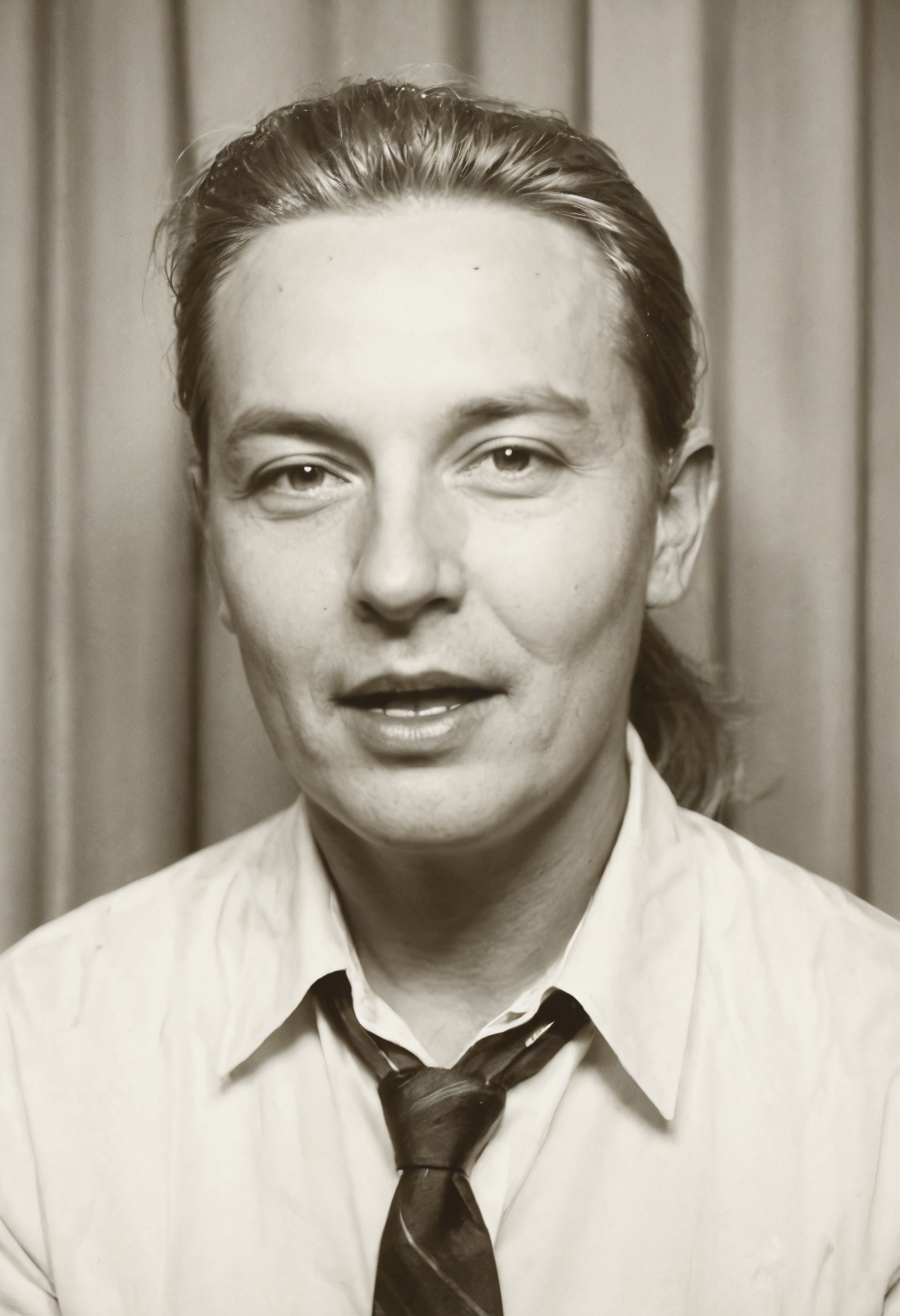 score_9, score_8_up, score_7_up, source_photo, photomaton, 1boy, mature, mature, solo, portrait, Flat oval head, dark_blonde_hair, ponytail, low_tie, open mouth, rating_safe, Hand-Colored Black and White Photo Look curtains, <lora:pony/photomaton_r1:0.6000000000000001>