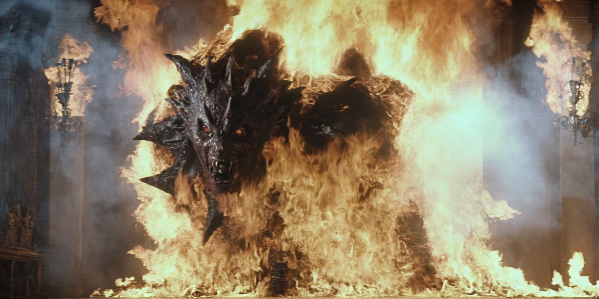 Horror-themed,  <lora:Fright Night 1985 Film Style:1>
Cinematic Medium Shot Film Footage captured by Panavision Cameras and Lenses a huge fireball is hitting a vampire creature person, laying on a wall with a huge fire spewing on, Fright Night 1985 Film Style, Eerie, unsettling, dark, spooky, suspenseful, grim, highly detailed