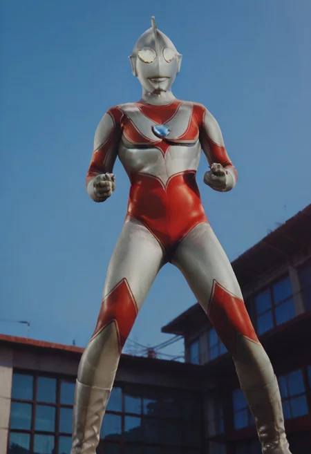 score_9, score_8_up, score_7_up, score_6_up, score_5_up, score_4_up,male focus,ultraman,a city where the remains of a slain monster remain, ultraman about to fly into the sky after the battle, a giant superhero taller than a building, the light on his chest is flashing red, no human,alien,giant superhero,silver head,hard mask,yellow glowing eyes,silver rubber bodysuit with red line, slim,glowing hemisphere on the chest,Double line,silver gloves and boots,no smile,no eyes,no nose,slim,huge,angle from below,negative_hand