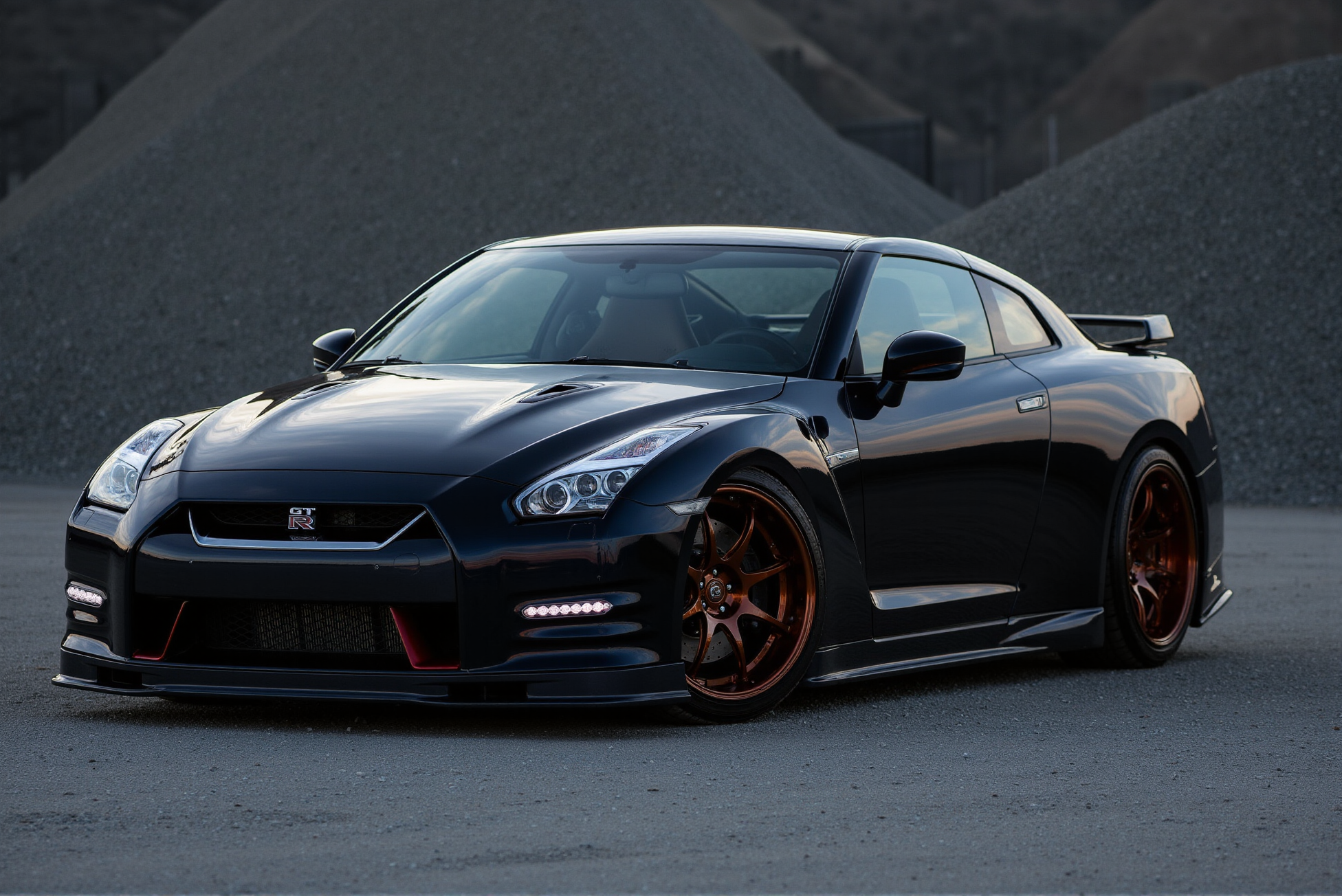 <lora:Nissan_GT-R_R35:0.8> 
A deep metallic blue Nissan GT-R R35 rests calmly under a softly clouded sky, captured in warm golden-hour lighting on a gravel-covered open lot. The low-slung stance, sharply sculpted hood, and flared front wheel arches convey poised aggression, while the sleek aerodynamic body panels reflect the muted amber light. The front grille prominently features the GT-R emblem set just above the chrome Nissan badge, both gleaming with subtle intensity. Multi-spoke alloy wheels finished in brushed silver house ventilated brake rotors and red Brembo calipers stamped with white branding. The side mirrors and front splitter echo dark gloss finishes, and the slight tilt in the camera angle adds a cinematic tension. Faint reflections ripple across the body, and thin wisps of fencing in the distance add scale and openness to the composition. The contrast between the grounded solidity of the vehicle and the expansive background builds visual drama, emphasizing the GT-R R35âs balance of power and elegance. Subtle tire tread texture and shadow gradation beneath the chassis provide depth and tactile realism, enhancing the visual gravity of this iconic performance coupe in a still, contemplative moment.