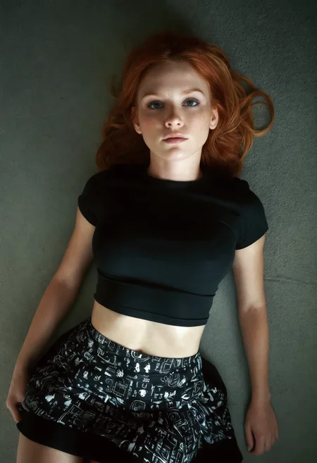 cinematic photo of sdxl_amandrow, black graphic tee with high-waist skirt, upper body, under hard light, from above, shot on a Diana F+