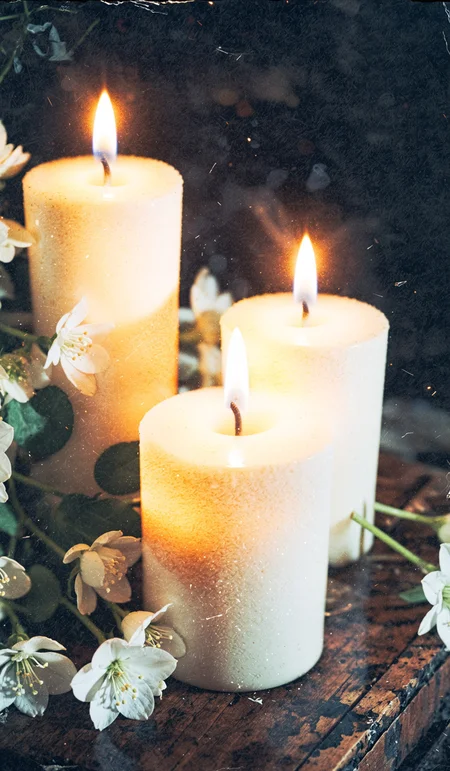 burning candlelight and white flowers tribute condolence memorial service announcement. with space for text an obituary, list of dead. Funeral concept, macro, closeup, selective focus. Dramatic unusual scene. Beauty world. Retro filter and vintage style. Instagram toning effect, breathtaking photograph, lensflare and bokeh effects, heavy film grain, shot on kodachrome with post-processing artifacts, reflecting particle effects, slight double exposure