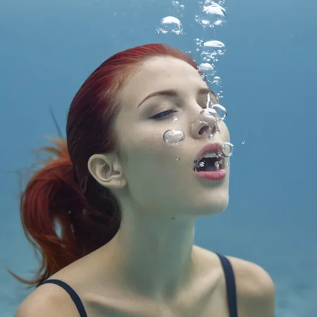 (absolutely highly detailed underwater photo), submerged asian girl, blowing air bubbles, underwater ocean environment, close-up
She is wearing a (silver color short wetsuit), she is slender, has narrow hips, tight ass, small ass, thigh gap and long legs, cute face, red hair pigtails floating around her head, dynamic pose
drkmdatmsftpicture
Underwater hair look, murky water
Twin ponytails, (red hair:1.5) accurate hands, accurate feet coral reef environment, the ground is white sand, very soft hair, her hair is floating in the water, blur the hair, dark blue background
back view, looking over her shoulder, she is facing to the left, (profile view:1.5) medium shot, pursed lips
exhaling air bubbles, air bubbles coming out of her mouth, raising air bubbles, air bubbles coming out of her nose, a few air bubbles inside her mouth, large trailing air bubbles at the top of the image, air bubbles at the corner of her mouth, air bubbles flowing out of her mouth, air bubbles flowing around the corners of her mouth, air bubbles in her hair, air bubbles trailing out of her mouth and nose
air bubbles have vertical (motion blur:0.4), air bubbles tinted (blue:1.3)
(best quality, incredible detail, ultra high skin detail:1.2) (cool light:1.5) (underwater:1.5) (skinny:1.3) (tight short wetsuit:1.4) (tight shorts:1.5) (floating hair:1.4) (skintight:1.4) (no wrinkles:1.3)