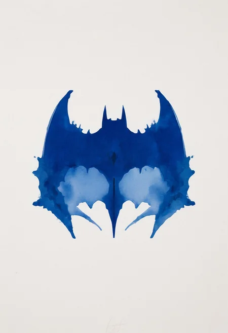 A rorschach-test resembling batmans Mask, symmetrical, dark-Blue and Grey ink,