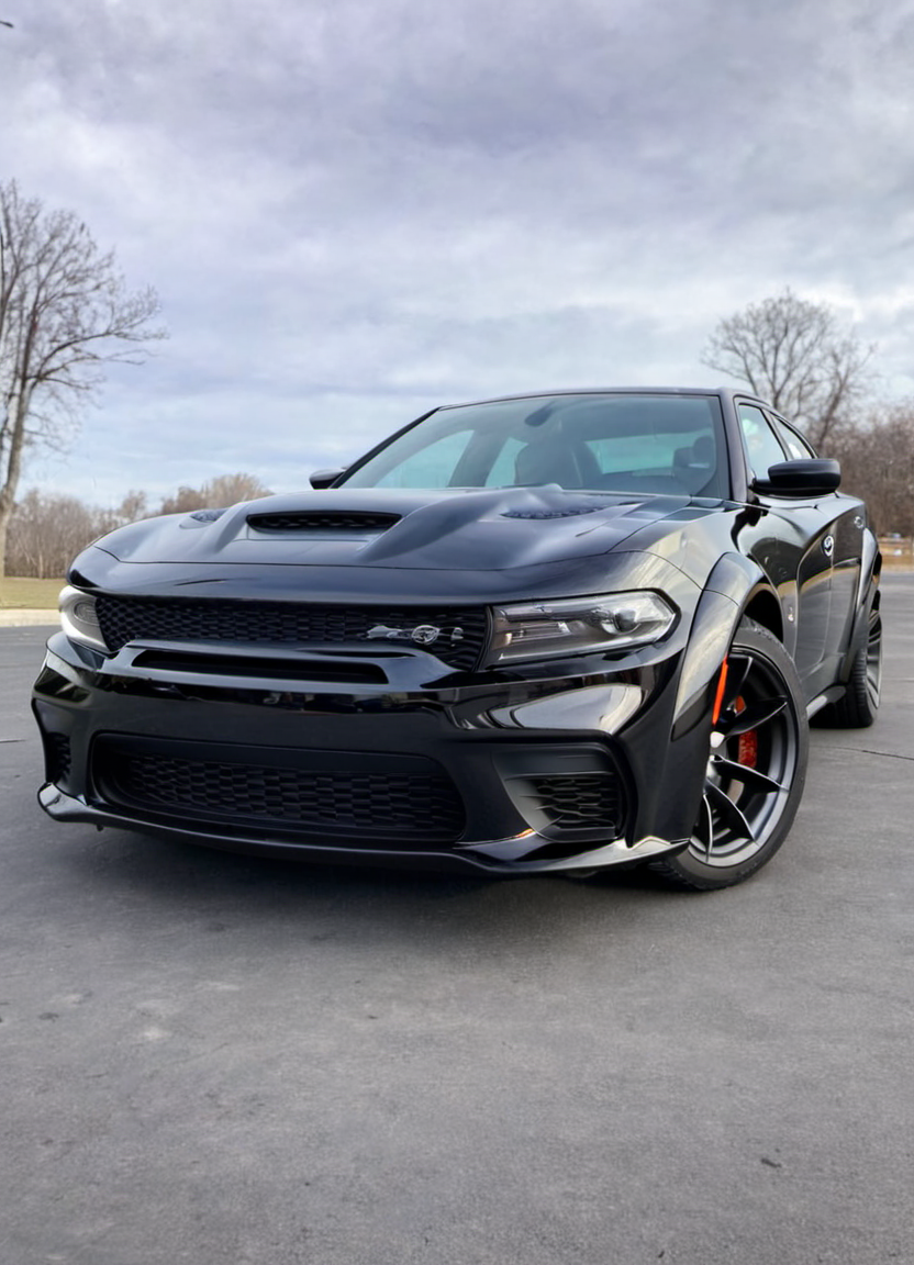 black chargerhellcatsrt seen from a very low angle, parked, front view, 
 <lora:ChargerHellcatSDXL:1>
