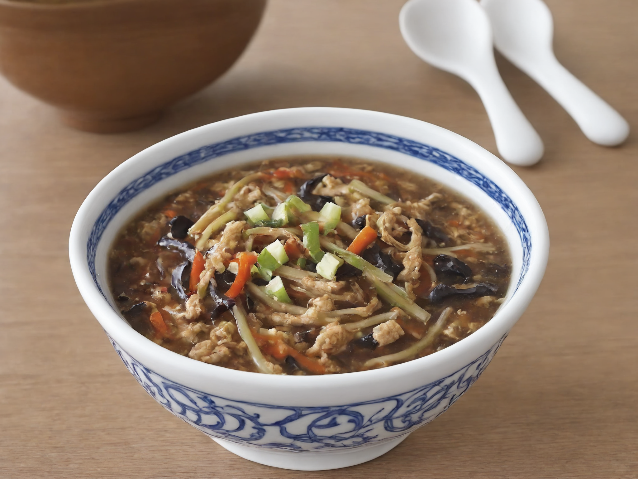 A bowl filled with sssoup, steaming and inviting. The sssoup should have a rich and appetizing color, possibly with visible ingredients or garnishes that enhance its appeal. The scene should be as realistic as a high-resolution photograph, with the focus primarily on the bowl and its contents. The lighting should be soft and warm, highlighting the textures and details of the sssoup,   <lora:sssoup5:0.85>