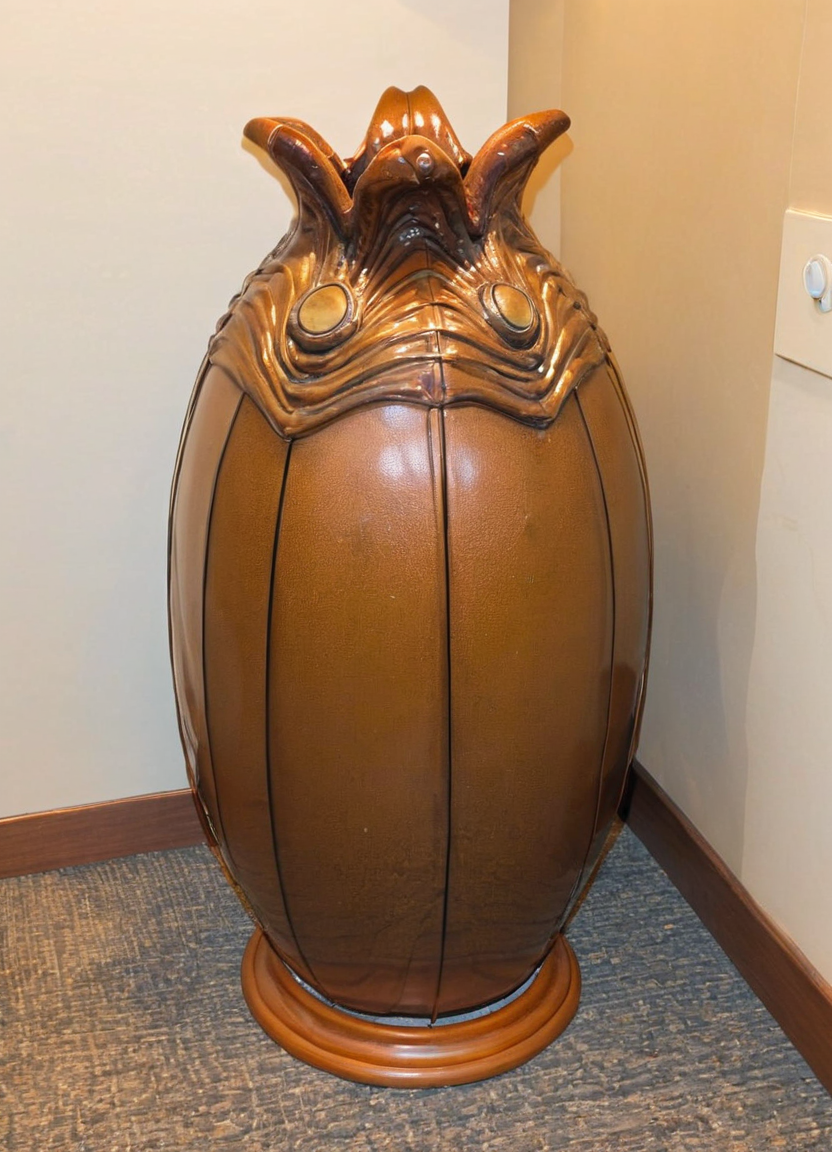 the xenoegg umbrella stand, hallway, door, many umbrellas, 
<lora:Xenomorph_Egg_SDXL:1> xenoegg