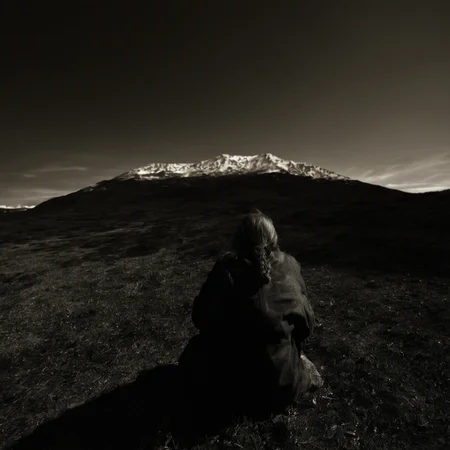 <lora:SDXL_feelings_Sa_May-v5:1> feelings, a woman sitting on a hill with a mountain in the background
