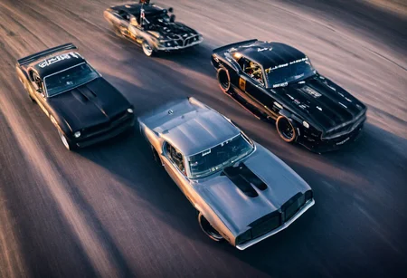 Creates an ultra detailed and realistic image taken by a drone, wide angle, of a race between 2 custom cars, created with parts from many muscle cars, with aerodynamic lines from 1972. The cars have tinted black windows. It is captured in motion with motion blur at full speed through a desert, daylight. Race between 2 cars. The photograph is captured with an Arri Alexa camera, with a zoom lens.
. <lora:Vintage Muscle Car SDXL:1>