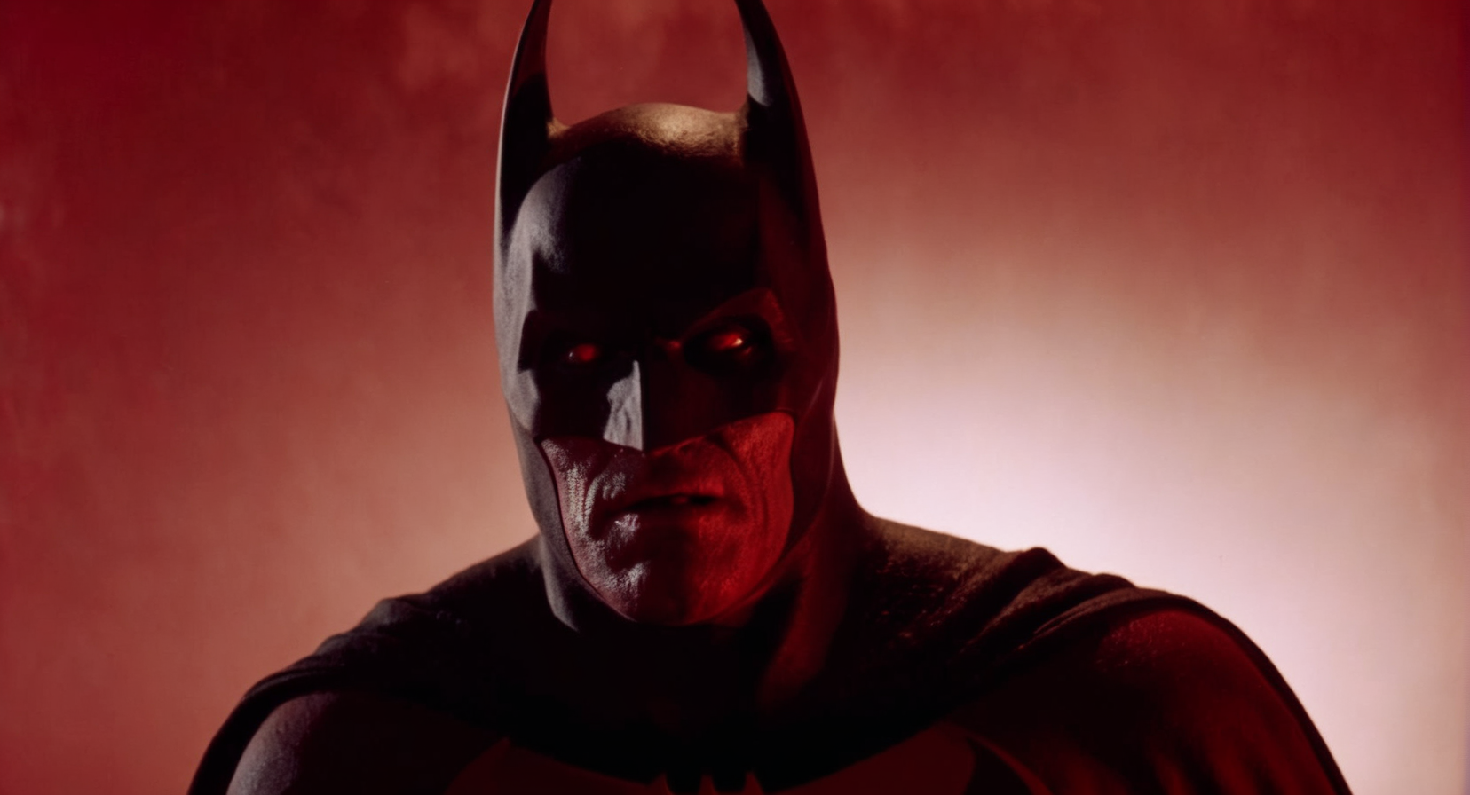 cinematic film still of  Cinematic Film stock footage in (arri alexa style) Kodak film print,   <lora:Batman Vampire:1> Batman Vampire a batman villain with a red background and vampire fangs  <lora:Vampire-000003:1>, shallow depth of field, vignette, highly detailed, high budget, bokeh, cinemascope, moody, epic, gorgeous, film grain, grainy