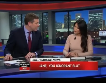 Man and a woman sitting behind news desk on SNL Headline News reading the latest headlines. The TV overlay says "SNL HEADLINE NEWS" with the headline "JANE, YOU IGNORANT SLUT". <lora:Concept_morse-BBCNewsroom-FLUX:1>.