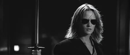cinematic film still of  <lora:Kill Bill style:1>
From above, Cinematic film image of The Blonde a woman holding a sword in a dark room,solo,1boy,jacket,monochrome,weapon,greyscale,male focus,sunglasses,realistic , Kodak film grain, dramatic light, dramatic shadow light, contrast, saturated color, cinematic, filmic, motion picture, realistic, realism, perfection, perfect, deep focus, clean image, Kill Bill style, Kill Bill Film Style, shallow depth of field, vignette, highly detailed, high budget, bokeh, cinemascope, moody, epic, gorgeous, film grain, grainy