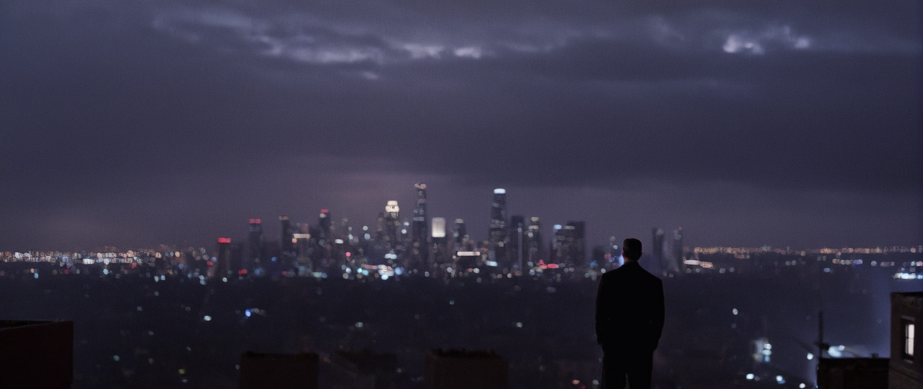 cinematic film still of <lora:Film Grain style:0.5> Film Grain:1 style
 <lora:Kodak Motion Picture Film Style v4:0.5>
 <lora:Chiaroscuro Lighting Style:0.8>
dramatic, cinematic, shadow, partially covered in shadow, a city at night with a rain shower Chiaroscuro Lighting Style, outdoors, sky, no humans, night, building, scenery, science fiction, city, cityscape, dark, city lights, shallow depth of field, vignette, highly detailed, high budget, bokeh, cinemascope, moody, epic, gorgeous, film grain, grainy